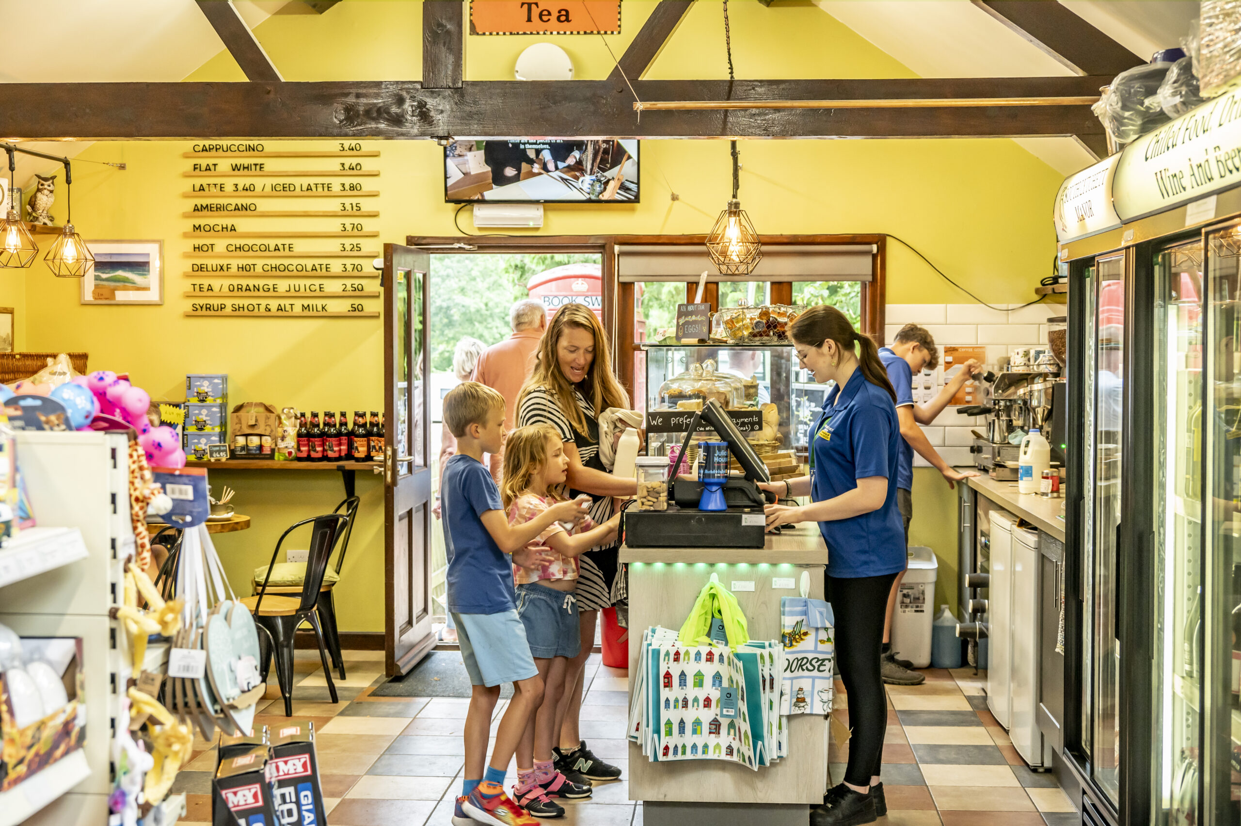 Customers purchasing provisions from the shop at South Lytchett Manor