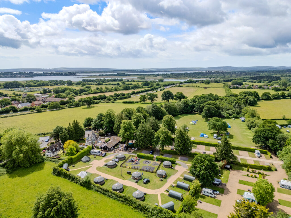 Aerial view of glamping pods at South Lytchett Manor